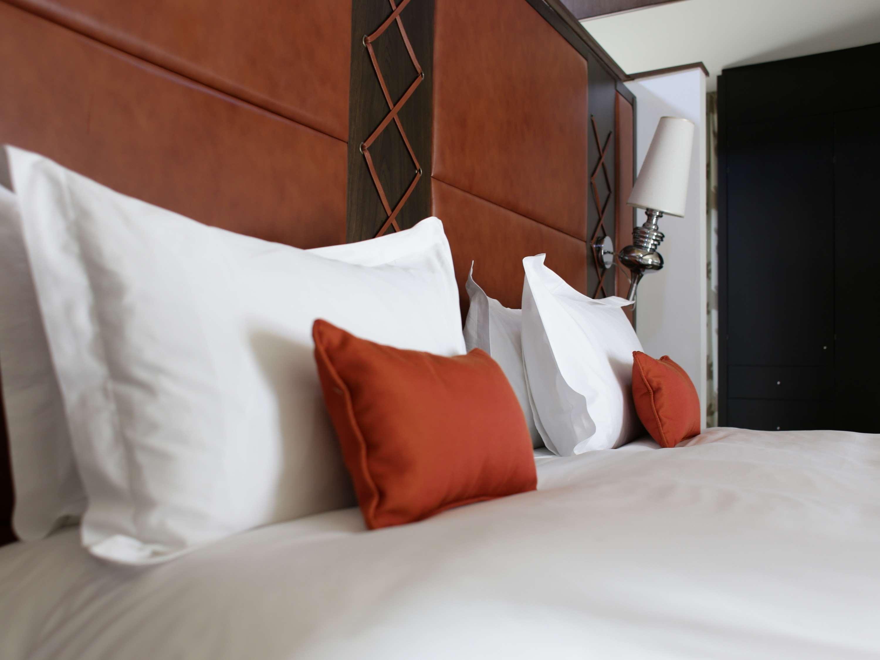 Sofitel Montevideo Casino Carrasco & Spa Extérieur photo A bed with pillows